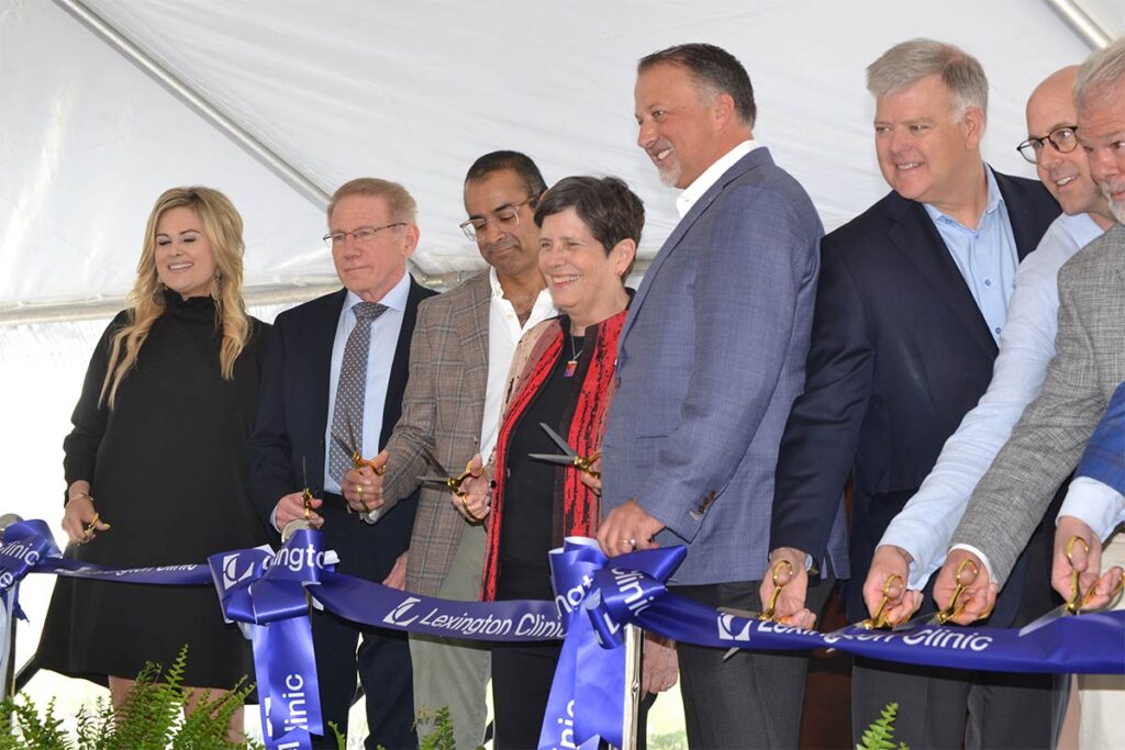 Cutting the ceremonial ribbon were officials from Lexington Clinic including Tharun Karthikeyan, MD, president of the board, Lexington Mayor Linda Gorton, Stephen J. Behnke, MD, MBA, CEO, Robert L. Bratton, MD, MMM, CMO