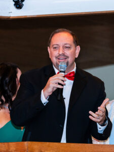 Matt Grimshaw, market president, CHI Saint Joseph Health, addresses the audience from the auctioneer’s booth at Fasig-Tipton prior to the live auction.