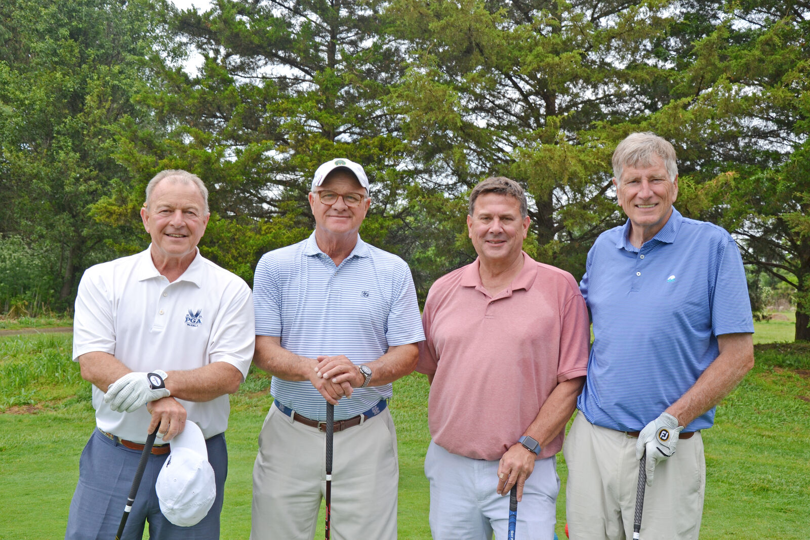 A team from ProAssurance included John DeWeese, Tom Hall, Cy Radford, and Bruce Miller.