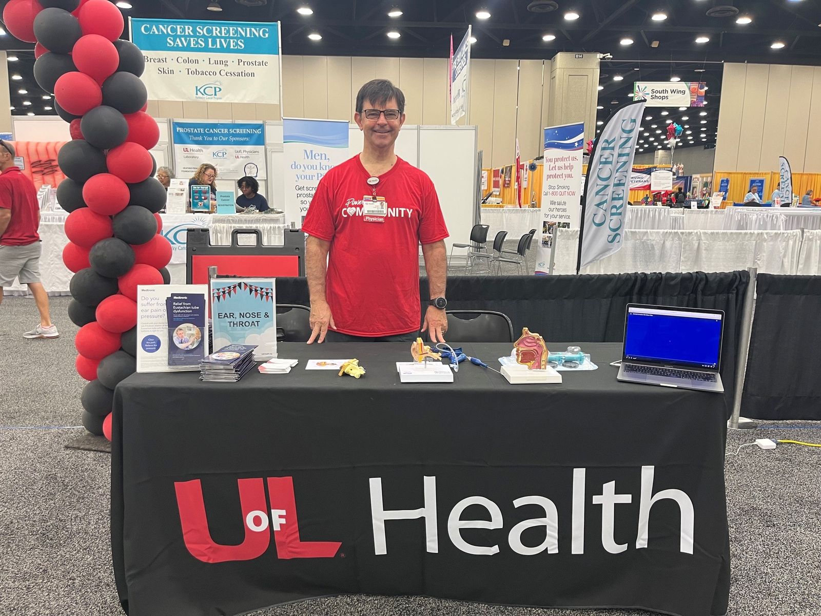 Dr. Joseph Creely at the UofL Health ENT table