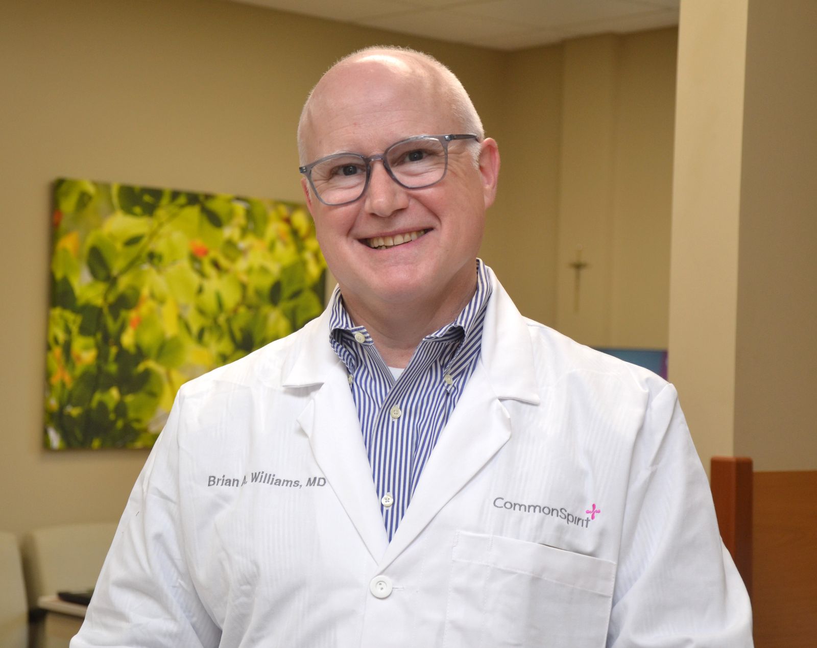 Brian Alex Williams, MD, in a white coat